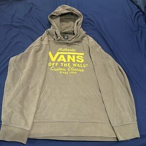 Vintage-looking X-Large men’s green base with yellow writing hoodie. Vans brand.